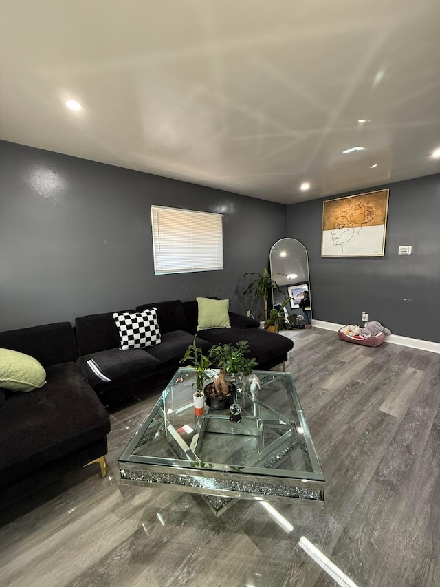 living room with recessed lighting, wood finished floors, and baseboards