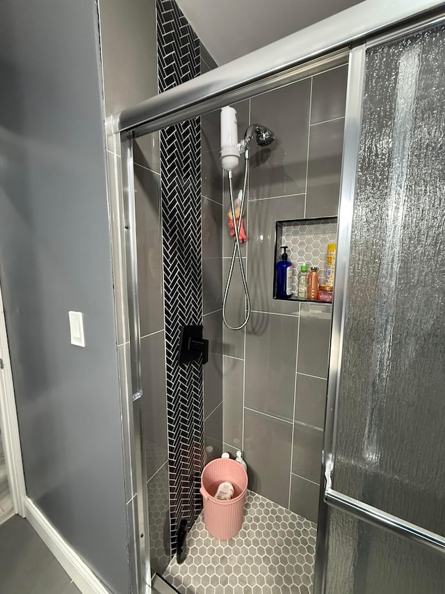 bathroom with a stall shower