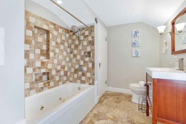 full bath with baseboards, toilet, a combined bath / shower with jetted tub, vaulted ceiling, and vanity