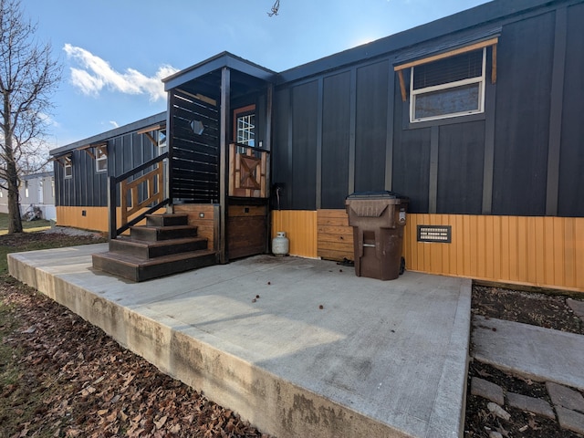 view of front of house with entry steps and crawl space