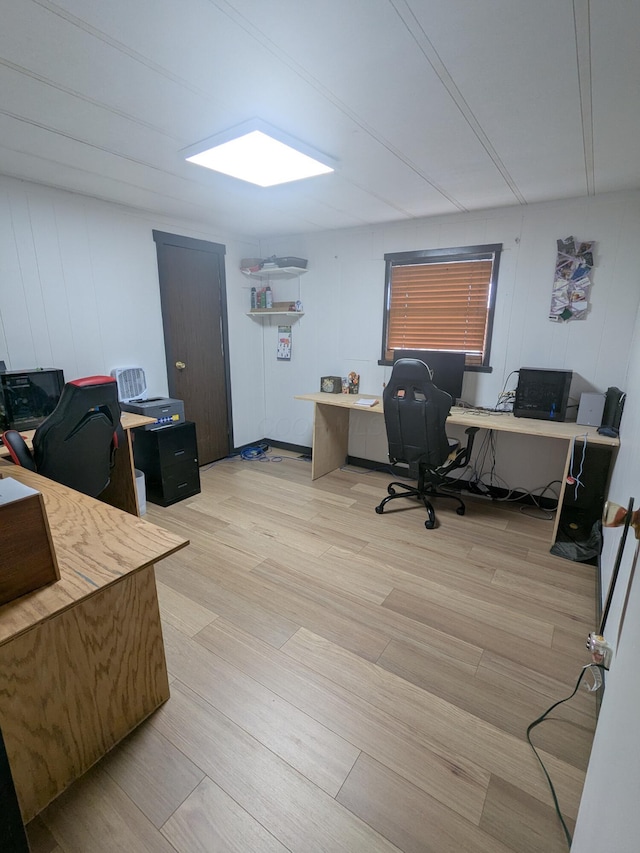 office space with light wood-style floors