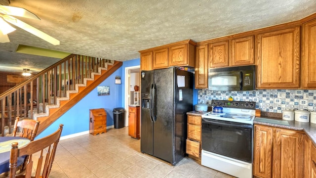 kitchen featuring decorative backsplash, black appliances, and brown cabinetry