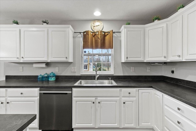 kitchen with white cabinets, dishwasher, and a sink