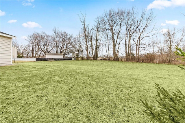 view of yard with fence