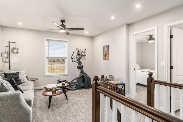 exercise area with carpet floors and recessed lighting