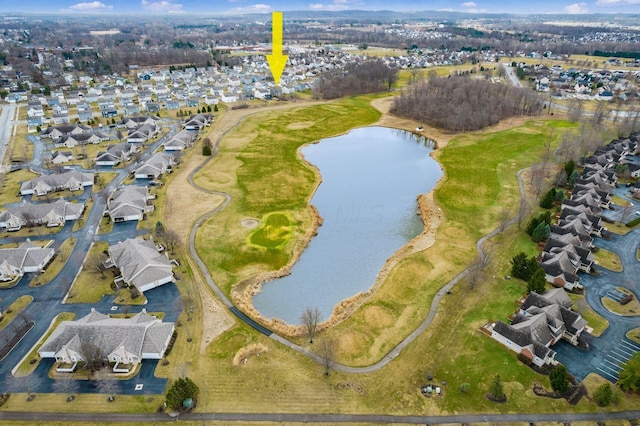 bird's eye view featuring a water view and a residential view