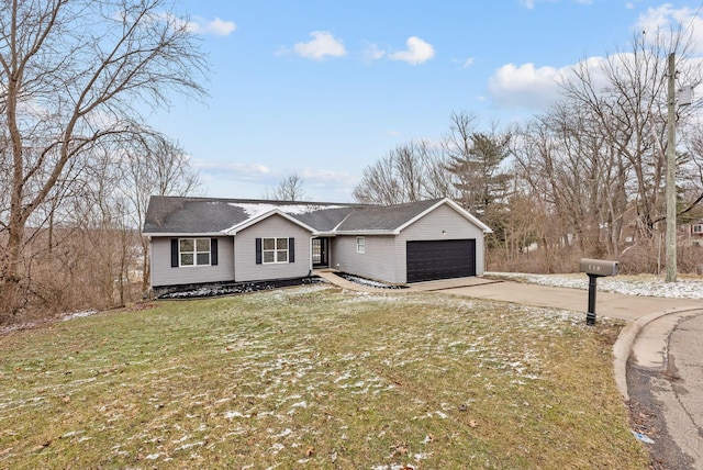 ranch-style home featuring concrete driveway, an attached garage, and a front lawn