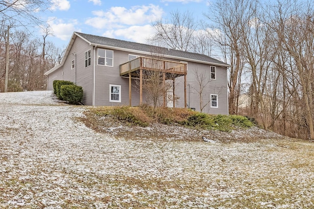 exterior space featuring a wooden deck