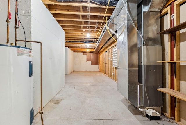 unfinished basement featuring water heater and heating unit