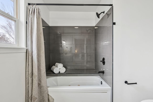 bathroom featuring shower / tub combo