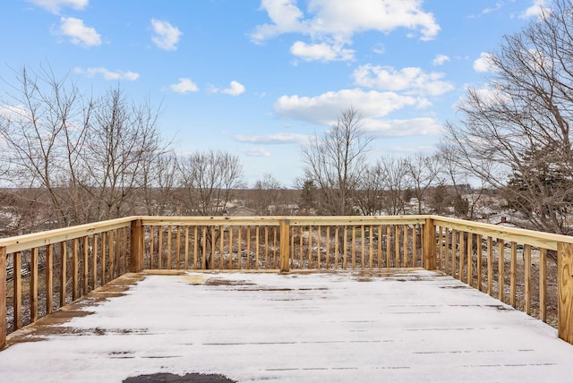 view of snow covered deck