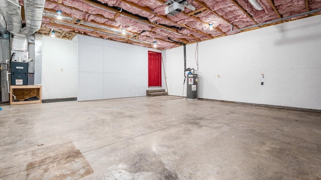 unfinished basement with heating unit and water heater