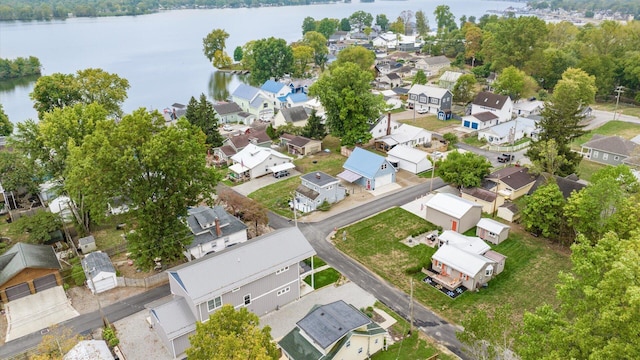 bird's eye view featuring a residential view and a water view