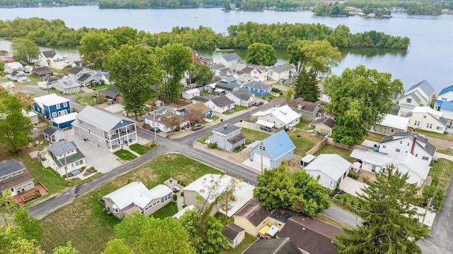 aerial view with a water view and a residential view