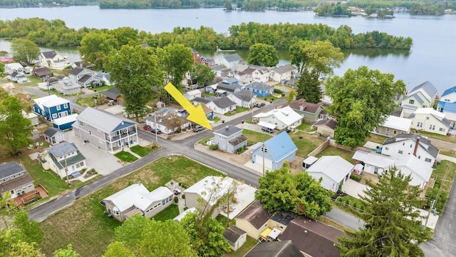 aerial view with a water view and a residential view