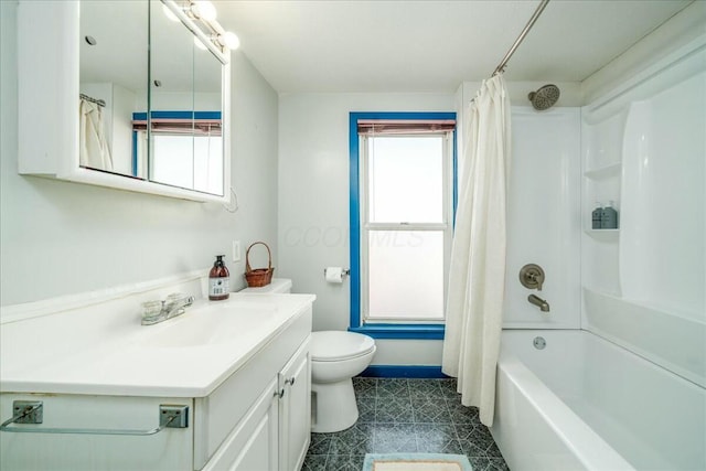 bathroom featuring baseboards, toilet, shower / tub combo with curtain, and vanity