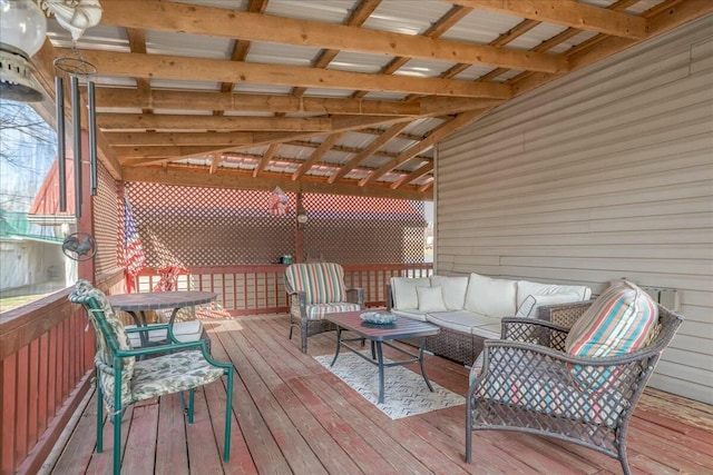 wooden terrace with outdoor lounge area