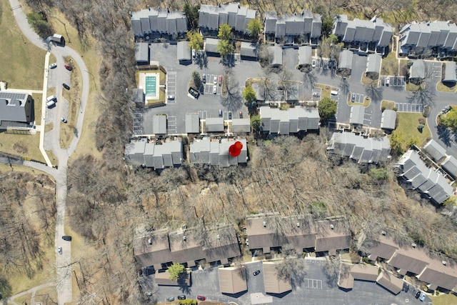 birds eye view of property with a residential view