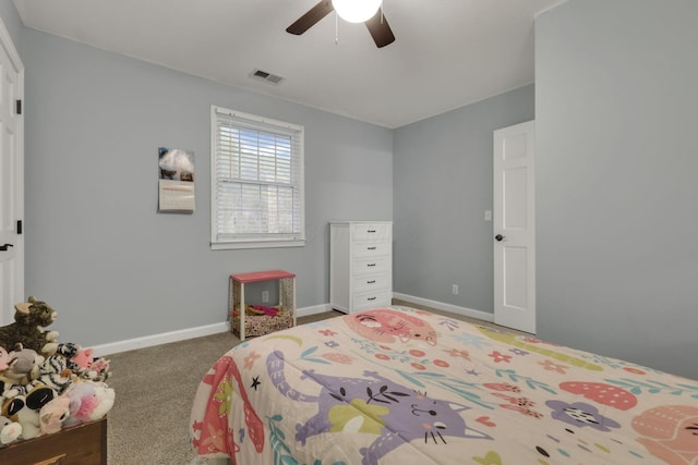 bedroom featuring visible vents, carpet flooring, baseboards, and a ceiling fan