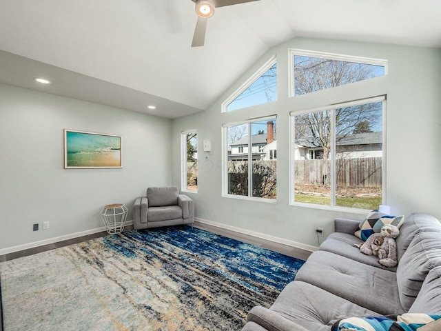 sitting room with recessed lighting, baseboards, lofted ceiling, and a ceiling fan