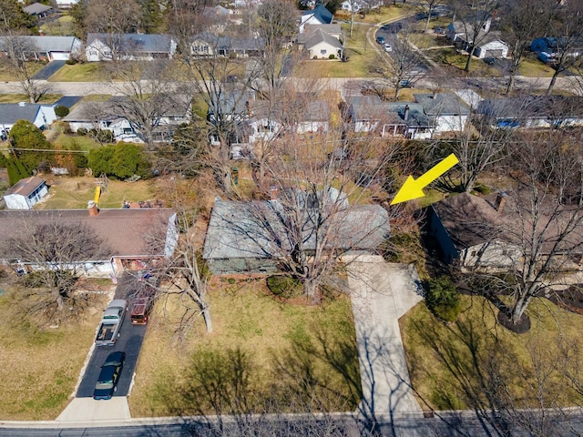 birds eye view of property with a residential view