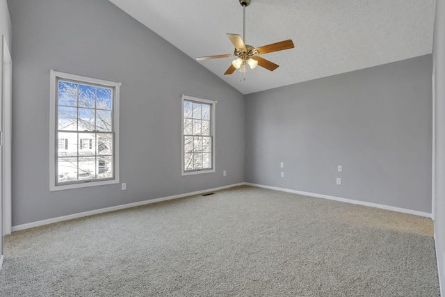 empty room featuring visible vents, baseboards, ceiling fan, carpet floors, and a textured ceiling