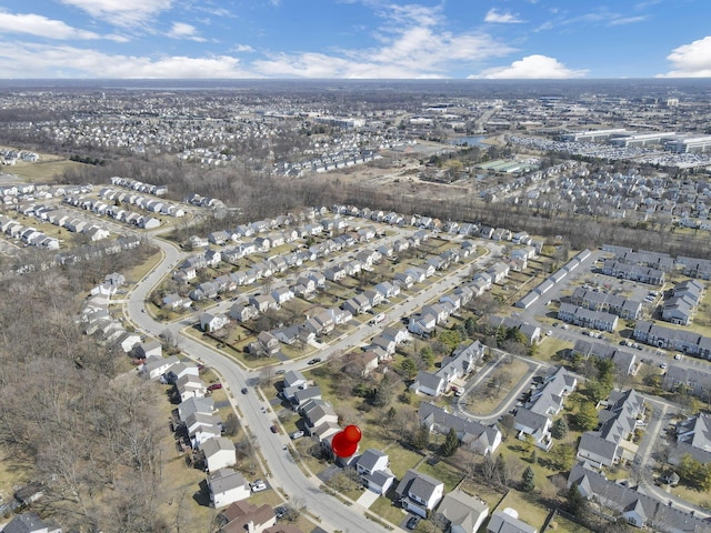 birds eye view of property with a residential view