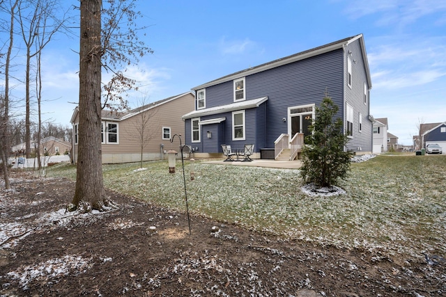 rear view of house with a patio