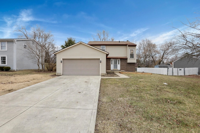 view of front of house with concrete driveway, an attached garage, fence, a front lawn, and brick siding