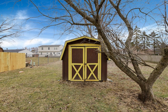 view of shed featuring a fenced backyard