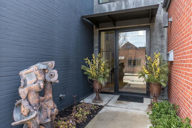 entrance to property with brick siding