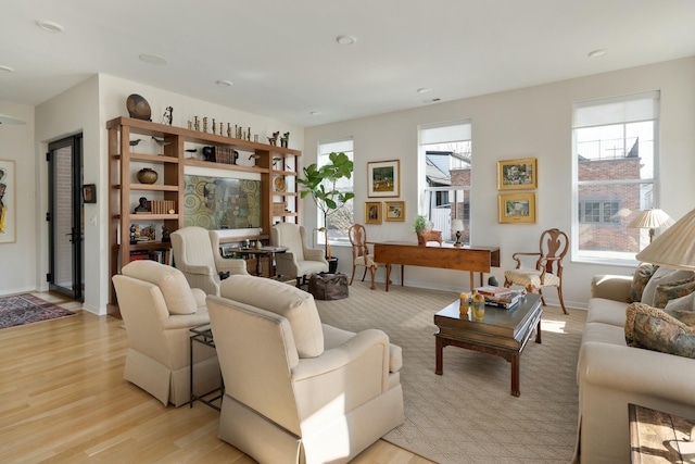 living room with light wood-style floors and baseboards