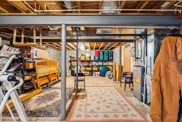 unfinished basement featuring visible vents