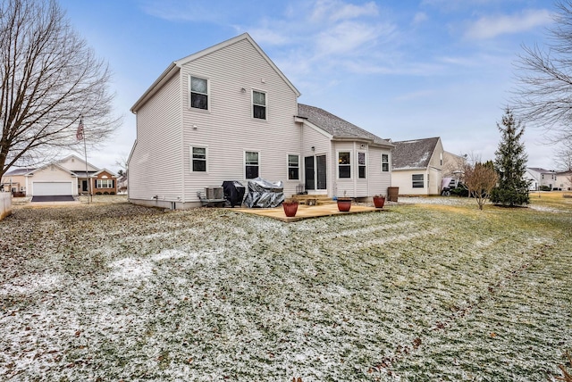 back of property with an outbuilding and entry steps