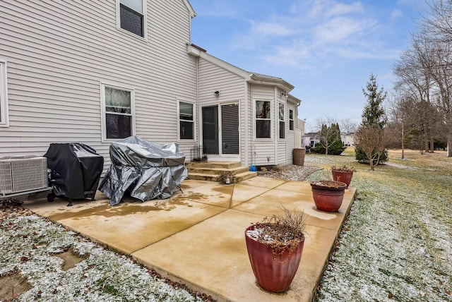 view of patio featuring a grill and central AC unit