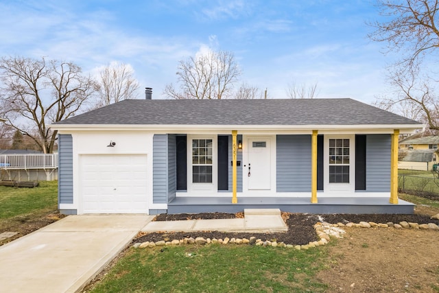 ranch-style home with a garage, covered porch, a shingled roof, and concrete driveway