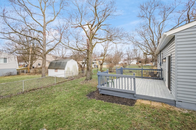 view of yard with a fenced backyard and a wooden deck