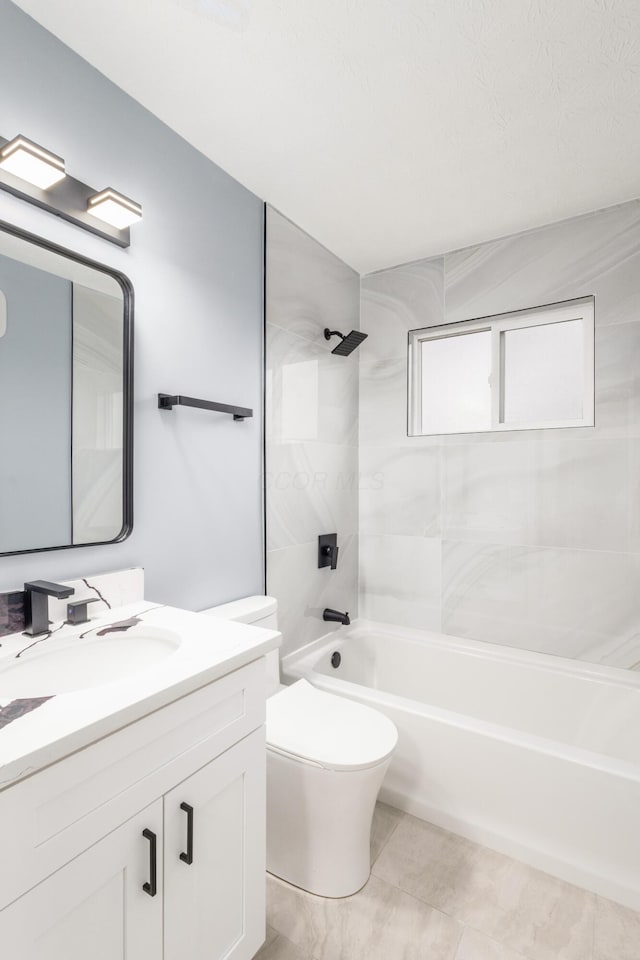 bathroom featuring toilet, shower / bath combination, and vanity