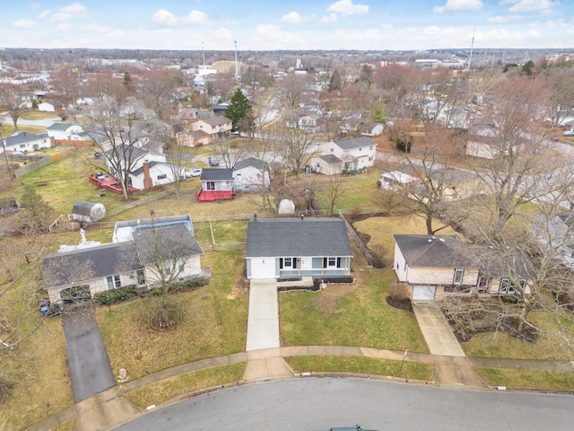 birds eye view of property with a residential view