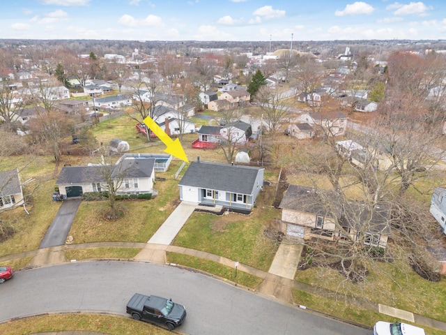 birds eye view of property with a residential view