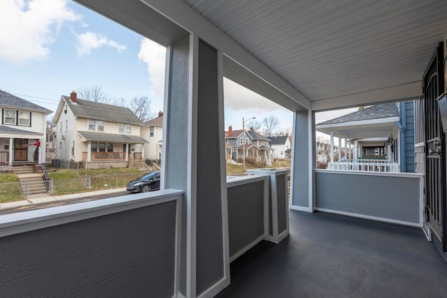 balcony featuring a residential view