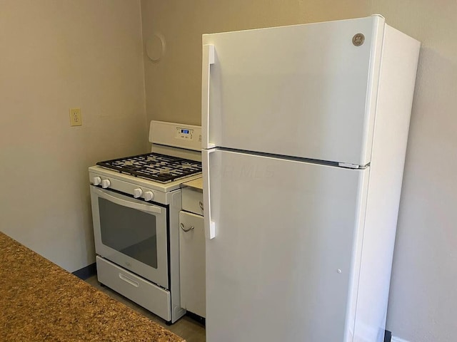 kitchen featuring white appliances