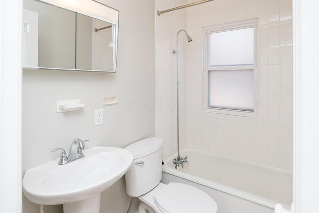 full bath featuring toilet, shower / bathing tub combination, and a sink