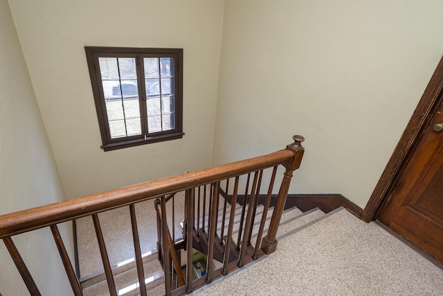 staircase with baseboards