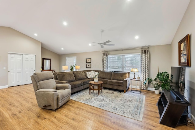 living area with recessed lighting, wood finished floors, a ceiling fan, baseboards, and vaulted ceiling