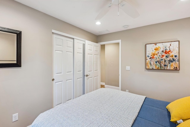 bedroom with recessed lighting, a closet, and ceiling fan