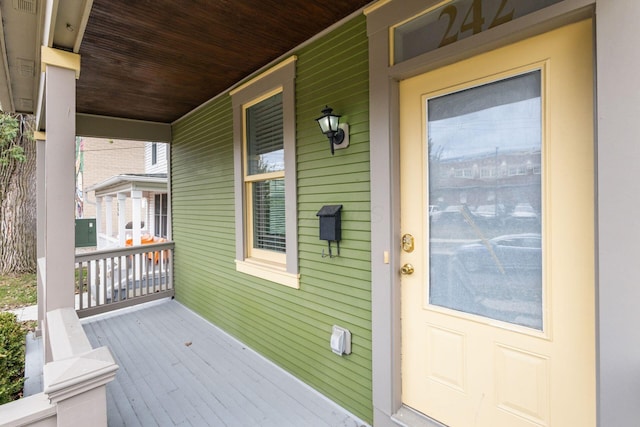 entrance to property with a porch