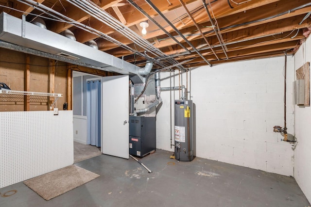 unfinished below grade area featuring heating unit and water heater