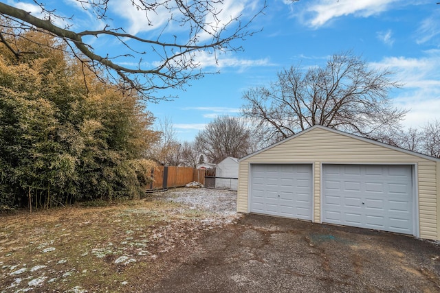 detached garage with fence