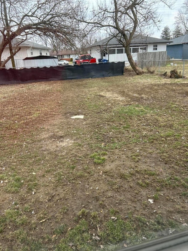 view of yard featuring fence